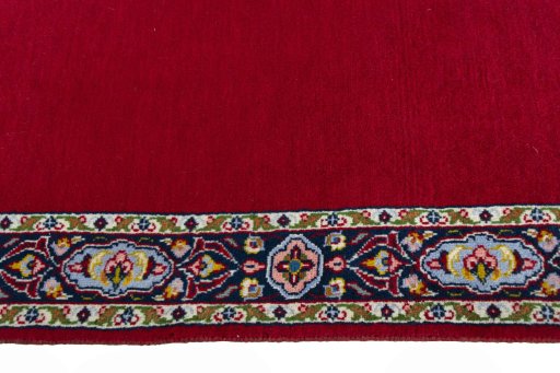 Close-up detail of 2000s Kashan rug from Iran / Persia showing Wool weave