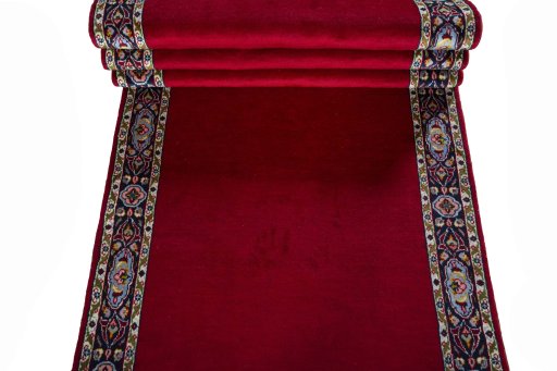 Full view of 2000s Kashan rug from Iran / Persia, 409 × 95 cm in Red tones