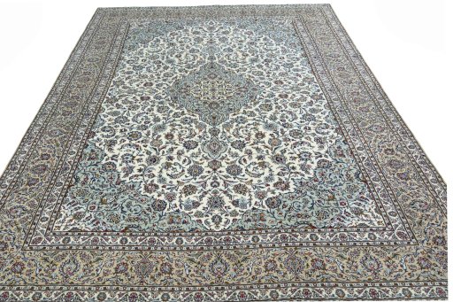Surface texture of 2000s Kashan rug with natural Wool and intricate pattern