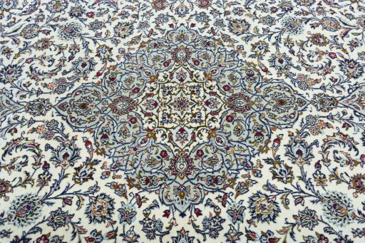 Central medallion detail of 2000s Kashan rug from Iran / Persia