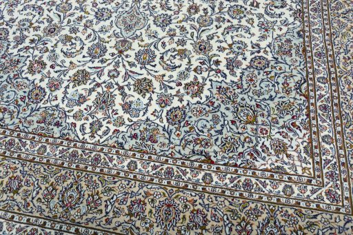 Close-up detail of 2000s Kashan rug from Iran / Persia showing Wool weave