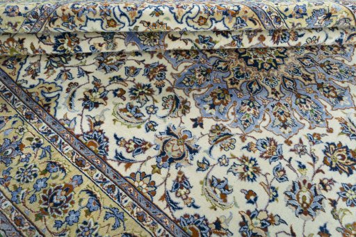 Close-up detail of 1970s Kashan rug from Iran / Persia showing Wool weave
