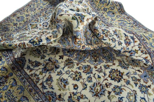 Surface texture of 1970s Kashan rug with natural Wool and intricate pattern