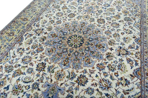 Backside of handmade 1970s Kashan rug showing knot structure and weave density
