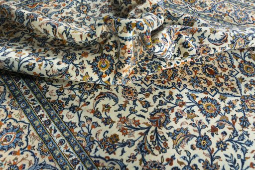 Surface texture of 2000s Kashan rug with natural Wool and intricate pattern