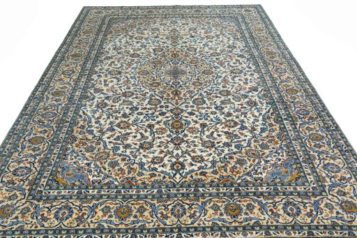 Surface texture of 2000s Kashan rug with natural Wool and intricate pattern