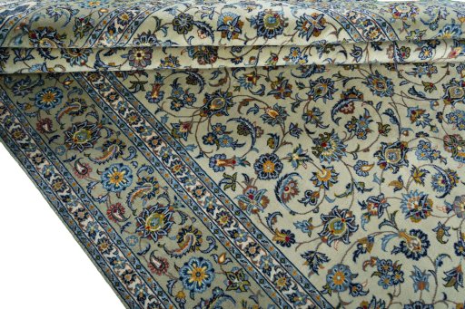 Close-up detail of 2000s Kashan rug from Iran / Persia showing Wool weave