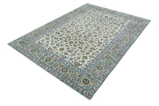 Corner detail of 2000s Kashan rug showing border pattern and Wool pile