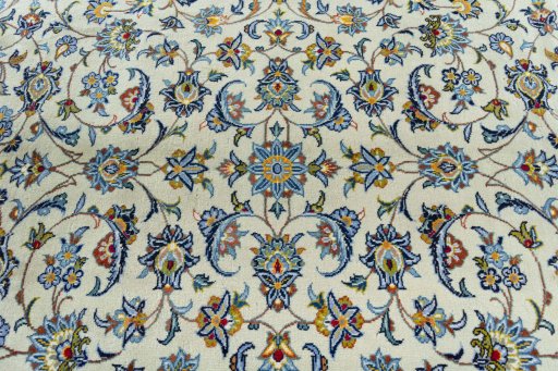 Central medallion detail of 2000s Kashan rug from Iran / Persia