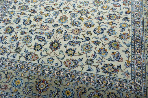 Close-up detail of 2000s Kashan rug from Iran / Persia showing Wool weave