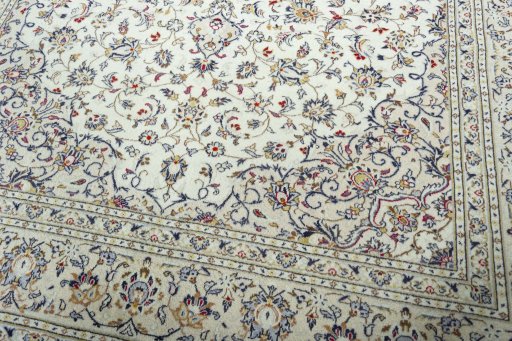 Close-up detail of 2000s Kashan rug from Iran / Persia showing Wool weave