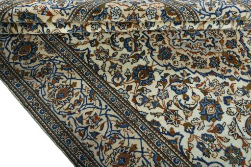 Close-up detail of 2000s Kashan rug from Iran / Persia showing Wool weave