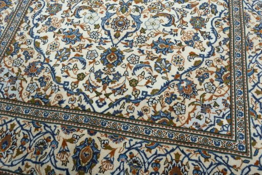 Close-up detail of 2000s Kashan rug from Iran / Persia showing Wool weave