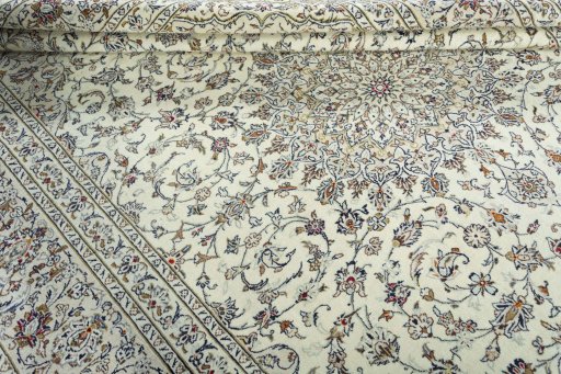 Close-up detail of 2000s Kashan rug from Iran / Persia showing Wool weave