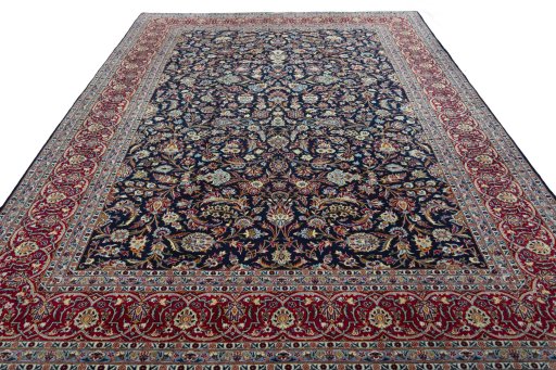 Surface texture of 2000s Kashan rug with natural Wool and intricate pattern