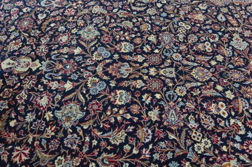 Central medallion detail of 2000s Kashan rug from Iran / Persia