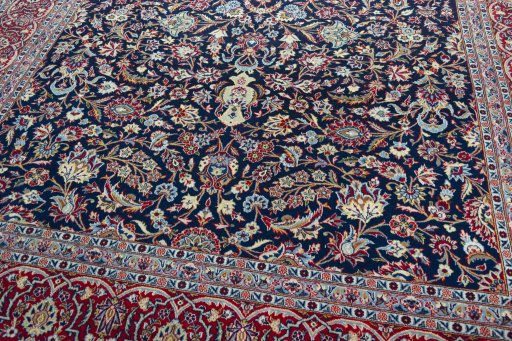 Close-up detail of 2000s Kashan rug from Iran / Persia showing Wool weave
