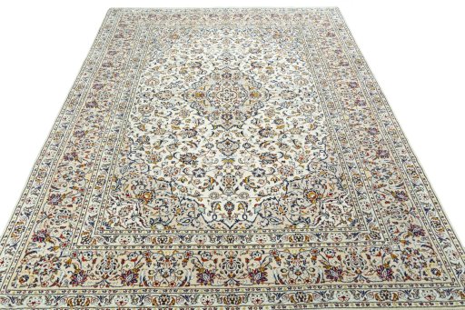 Surface texture of 2000s Kashan rug with natural Wool and intricate pattern