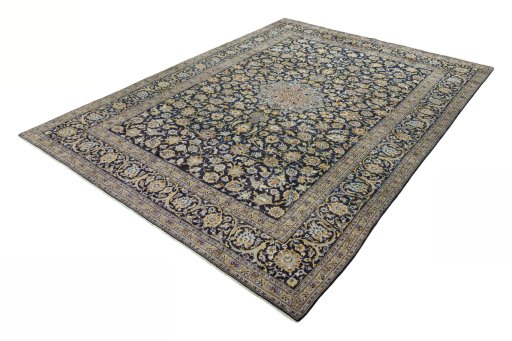 Corner detail of 2000s Kashan rug showing border pattern and Wool pile