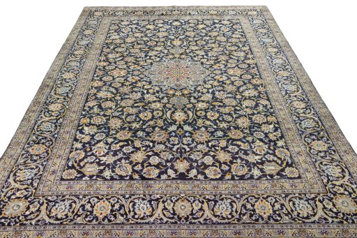 Surface texture of 2000s Kashan rug with natural Wool and intricate pattern