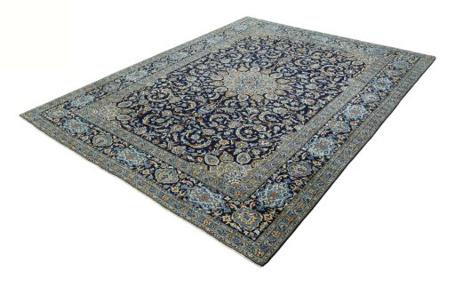 Corner detail of 2000s Kashan rug showing border pattern and Wool pile