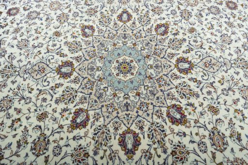 Central medallion detail of 2000s Kashan rug from Iran / Persia