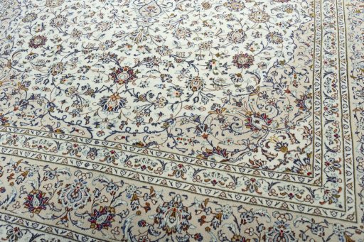 Close-up detail of 2000s Kashan rug from Iran / Persia showing Wool weave