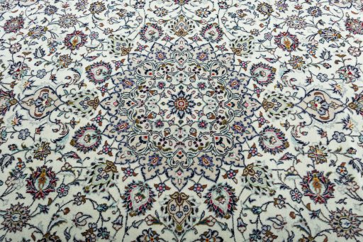 Central medallion detail of 2000s Kashan rug from Iran / Persia