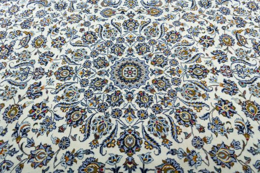 Central medallion detail of 2000s Kashan rug from Iran / Persia