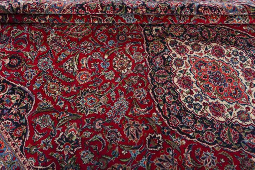 Close-up detail of 1950s Kashan rug from Iran / Persia showing Wool weave