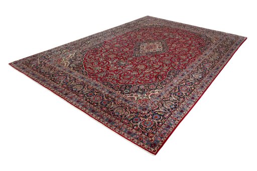 Corner detail of 1950s Kashan rug showing border pattern and Wool pile