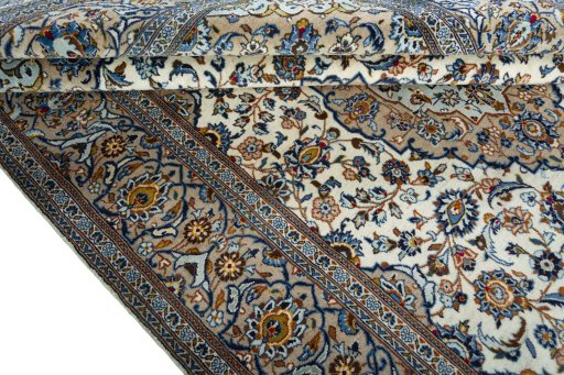 Close-up detail of 2000s Kashan rug from Iran / Persia showing Wool weave