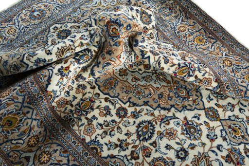 Surface texture of 2000s Kashan rug with natural Wool and intricate pattern