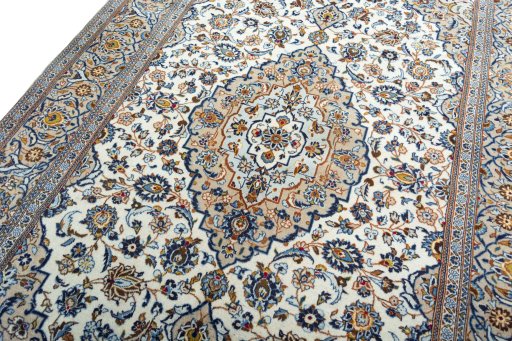 Backside of handmade 2000s Kashan rug showing knot structure and weave density
