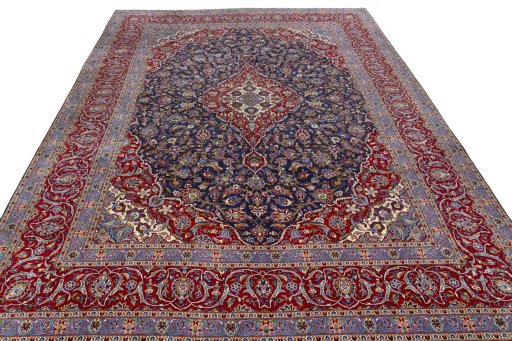 Surface texture of 2000s Kashan rug with natural Cork and intricate pattern