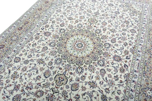 Backside of handmade 2000s Kashan rug showing knot structure and weave density