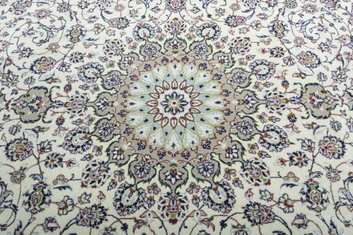 Central medallion detail of 2000s Kashan rug from Iran / Persia