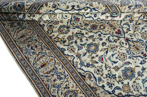 Close-up detail of 2000s Kashan rug from Iran / Persia showing Wool weave