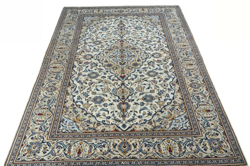 Surface texture of 2000s Kashan rug with natural Wool and intricate pattern
