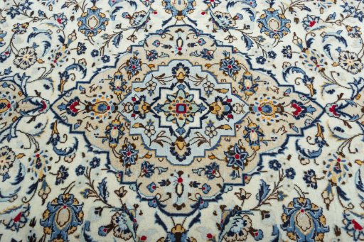 Central medallion detail of 2000s Kashan rug from Iran / Persia