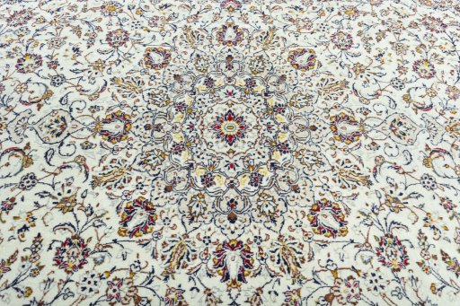 Central medallion detail of 2000s Kashan rug from Iran / Persia