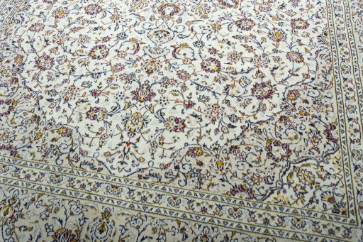 Close-up detail of 2000s Kashan rug from Iran / Persia showing Wool weave
