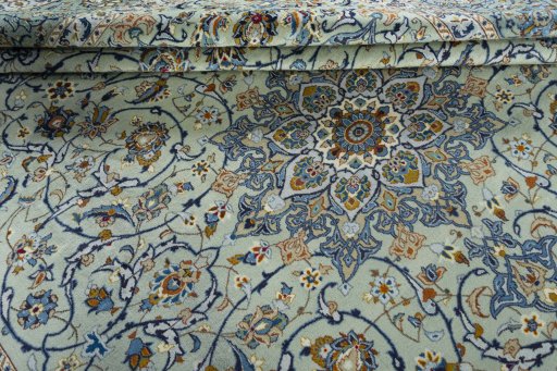 Close-up detail of 2000s Kashan rug from Iran / Persia showing Wool weave