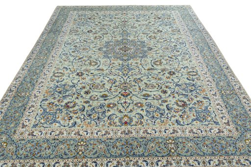 Surface texture of 2000s Kashan rug with natural Wool and intricate pattern