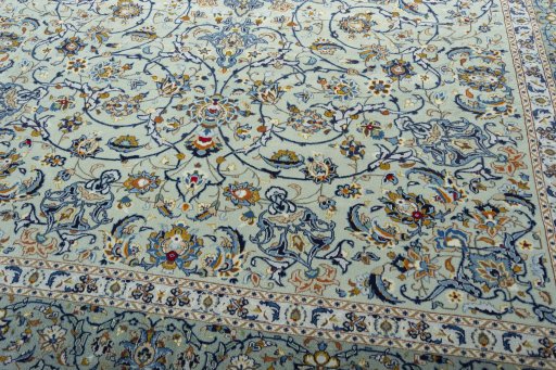 Close-up detail of 2000s Kashan rug from Iran / Persia showing Wool weave