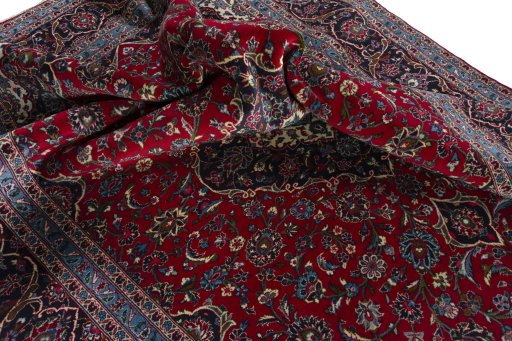 Surface texture of 2000s Kashan rug with natural Wool and intricate pattern
