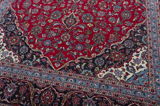Close-up detail of 2000s Kashan rug from Iran / Persia showing Wool weave