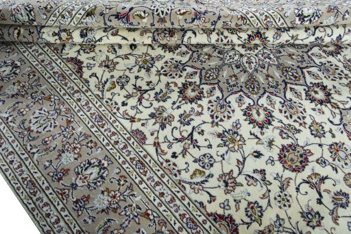 Close-up detail of 2000s Kashan rug from Iran / Persia showing Wool weave