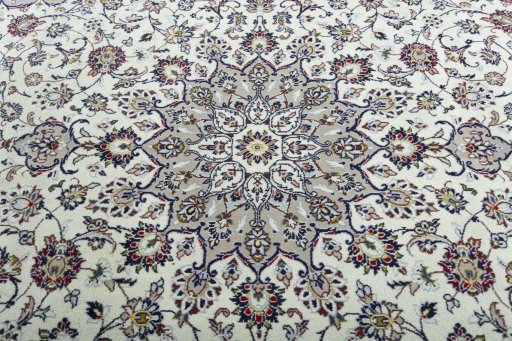 Central medallion detail of 2000s Kashan rug from Iran / Persia