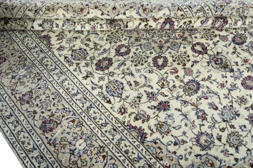 Close-up detail of 2000s Kashan rug from Iran / Persia showing Wool weave